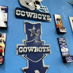 a wall with various sports memorabilia