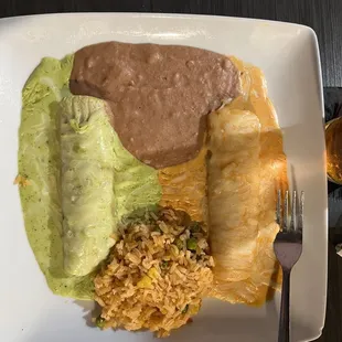 Poblano(green)  and chipotle(red)chicken enchiladas