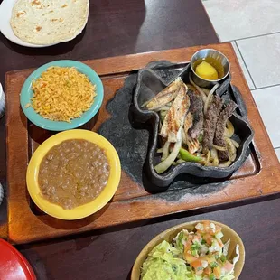 Fajitas. Where is the rest of the meat and only have two tortillas. Not worth the price