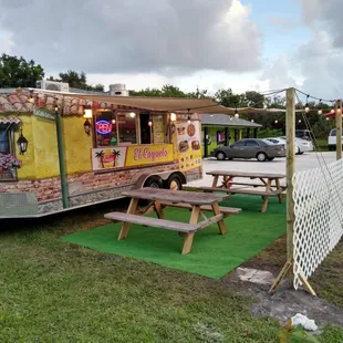 a food truck parked in a parking lot