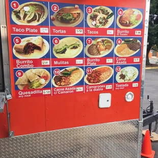 a menu on a food truck