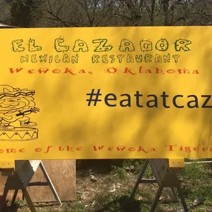 a sign for a restaurant