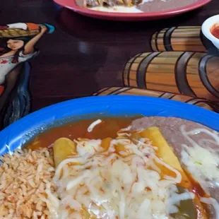 Spinach enchiladas and beef tamales