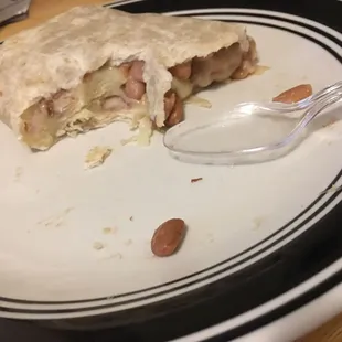 a half eaten burrito
