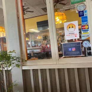 a sign in the window
