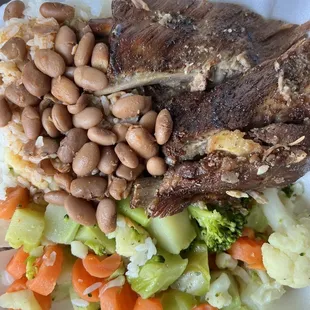 Baked ribs white rice pinto beans mixed vegetables