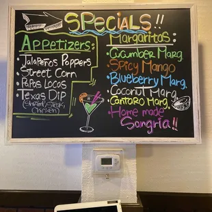 a menu on a chalkboard