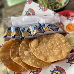 a plate of tortillas and salsa