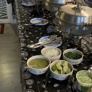 Carne asada, chicken, rice and beans with all the condiments.