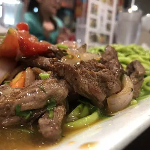 Lomo saltado and basil pesto pasta - the two combos melt in your mouth - the food is absolutely amazing