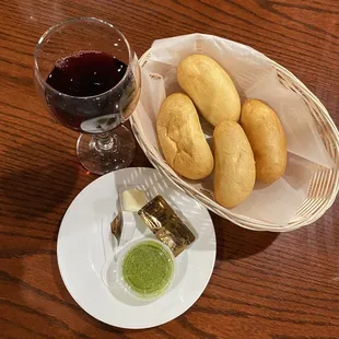 Wine, yummy bread, butter, and the AMAZING SPICY GREEN SAUCE!