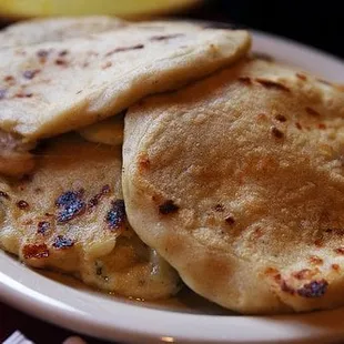 a plate of flatbreads on a table