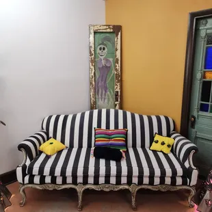 Take a moment and enjoy a coffee on the couch with a friend.
