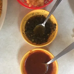 Complimentary red and green salsa and chips