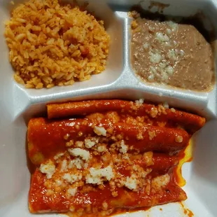 For about $7.00 bucks you get 3 enchiladas with rice &amp; beans plus tea