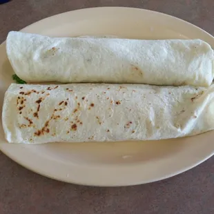1 guac and bean burito and 1 barbacoa burrito.  They are big, yessss....