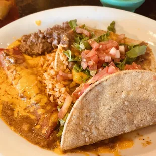 Mexican plate: enchilada, taco and chalupa