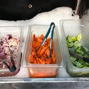 Pickled habanero onions, pickled carrots, limes