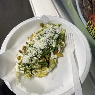 A chicken huarache with mild sauce  Huarache de pollo con salsa verde