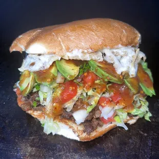 Asada Torta with cheese and avocado