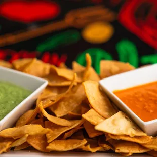 two bowls of salsa and tortillas