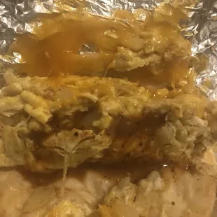 Potato/egg with red salsa, I paid to add cheese.