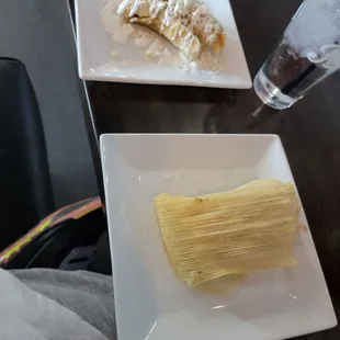 Two tamales one sheddred chicken and the cheese and pepper!  Yum!