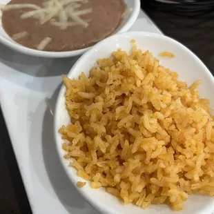Rice and beans served with shrimp tacos