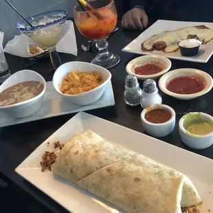 Breakfast burrito -ala carte burrito and huge sides of rice (fluffy!) and beans!