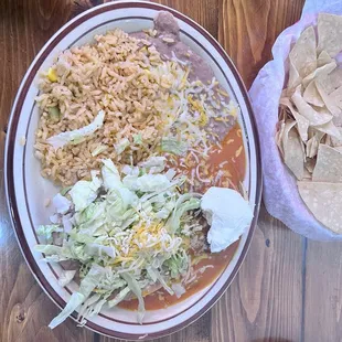 A bean tostada with a chili relleño
