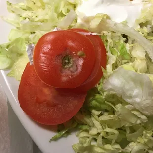 What the hell?? Dried and nasty end of a tomatoe