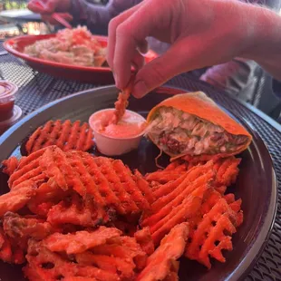 Steak burrito with sweet potato fries