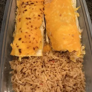 Chicken burritos and Mexican rice. Our awesome neighbors provided dinner for our entire family last night. This is the leftover.