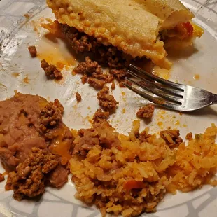 Round 2 plate...Beef Puffy Taco with last of rice and beans and salsa.  1/4/2022