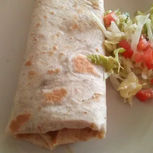 El Charro&apos;s chile con carne burrito...not smothered. Not much chile inside. Over salted.