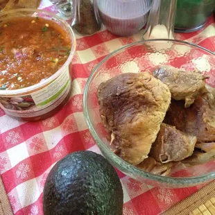 Fresh carnitas and great salsas. Grab a bag of chips and a 6 pack, you'll be set.