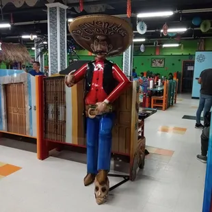 a statue of a man in a sombren