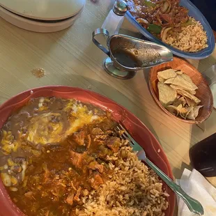 a table full of mexican food