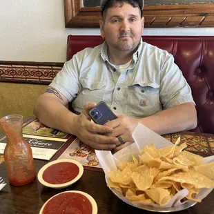 Hubby and our chips and salsa
