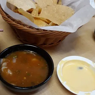 Chips and salsa and queso. Chips were crisp and salsa was warm. Queso was a bit bland but still melty cheese!