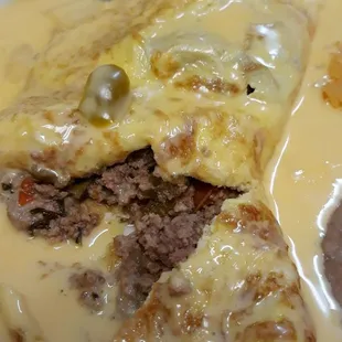 Picadillo beef inside the omelet