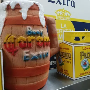 a large beer mug with the word el charroqueria written on it