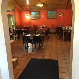 Entrance to main room of restaurant with comfortable seating.