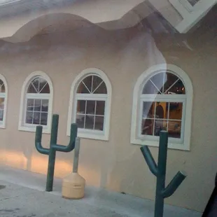 the outside of a building with multiple windows