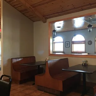 a table and benches in a restaurant