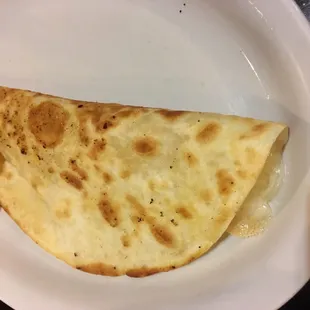Cheese quesadilla. Very very cheesy.