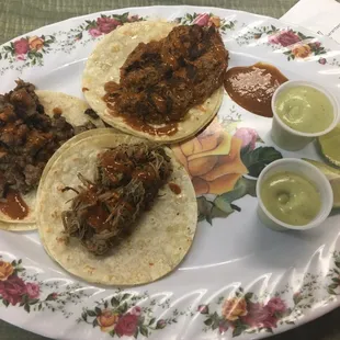 One Asada Taco (beef), one desehebrada c/ rajas taco (green chili beef) and one cochinita Pibil taco (shredded pork) plain