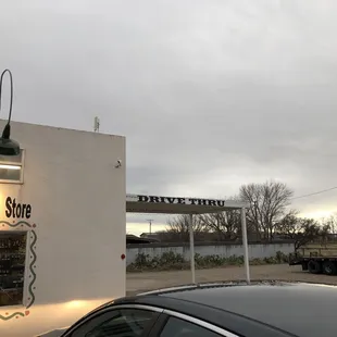 a car parked in front of it