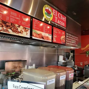 a restaurant counter and menus