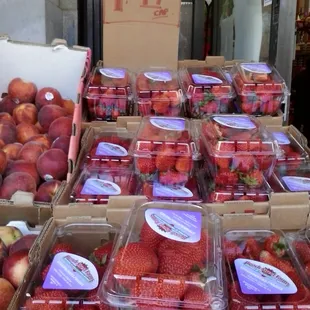 boxes of strawberries and peaches